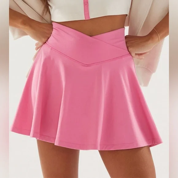 PacSun | PAC 1980 WHISPER Active Crossover Front Mini Skirt in Pink Medium - Picture 1 of 10